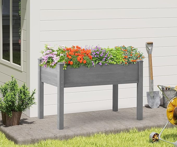 Outdoor wooden raised garden bed with legs