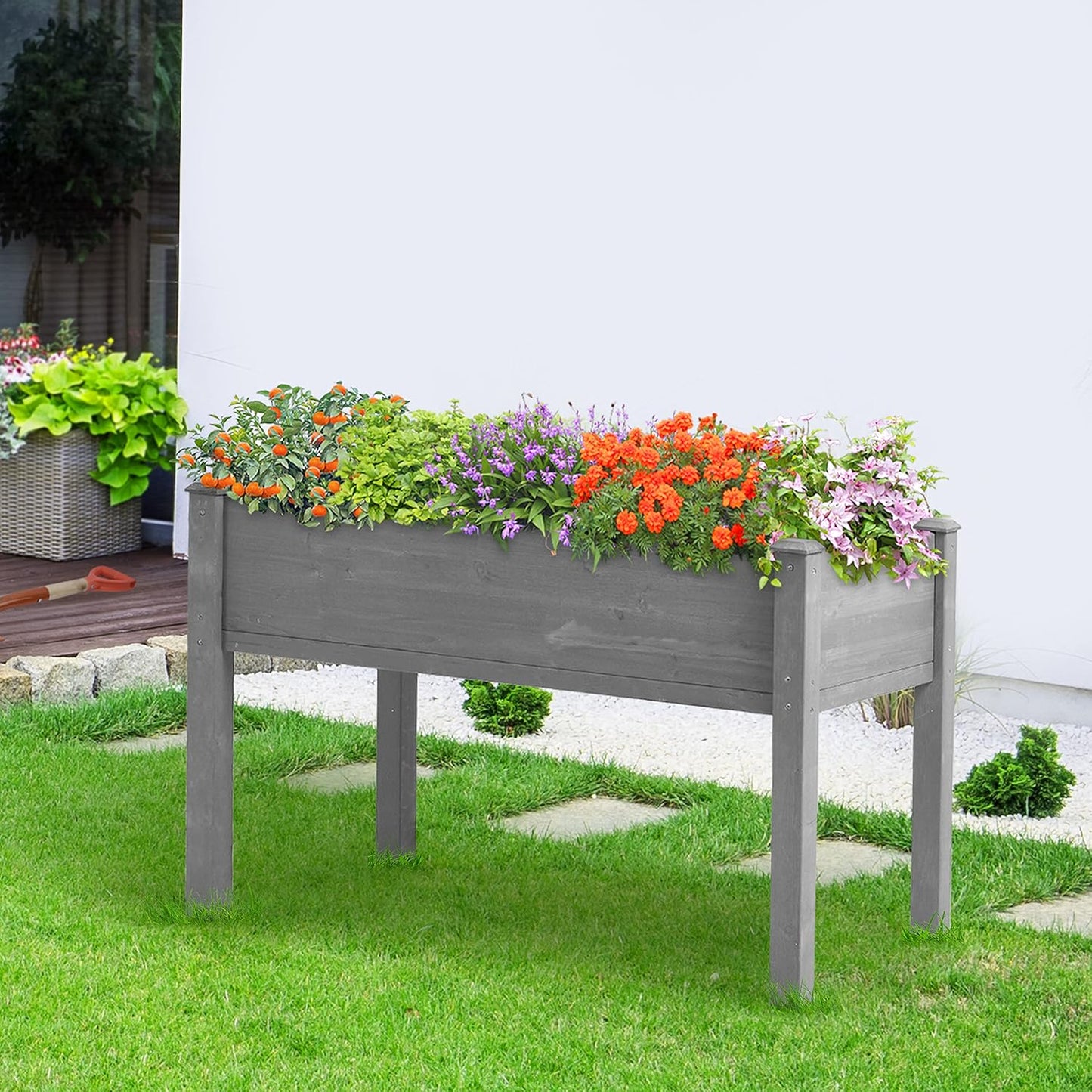 Outdoor wooden raised garden bed with legs